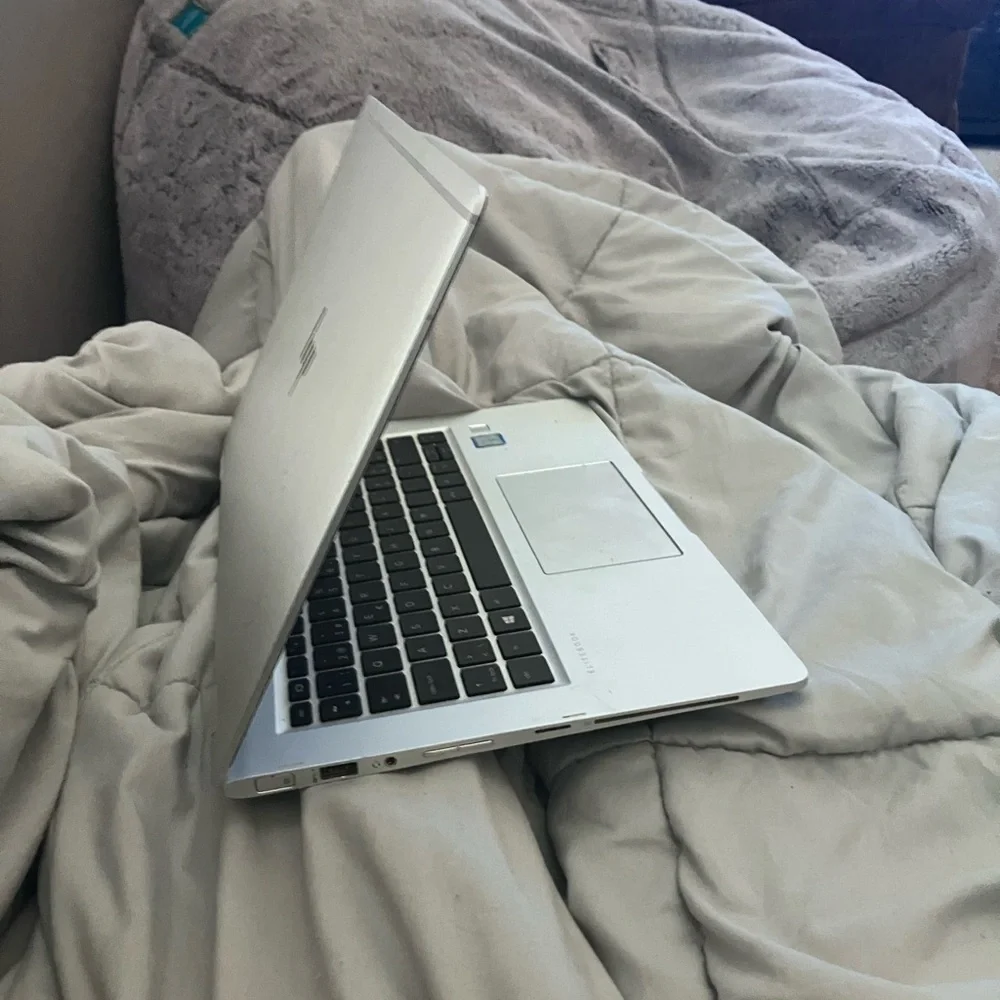 Intel Core i7 vPro Sticker on Silver Surface with Blue Accent